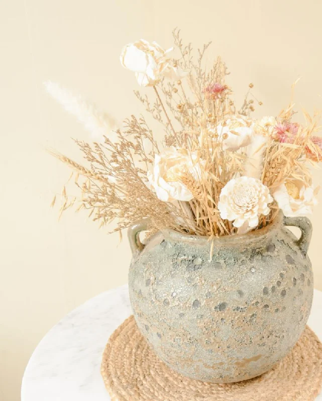 Elegant Pairing of Vase and Dried Flowers